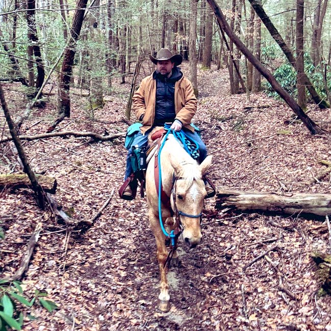 Caleb on horseback