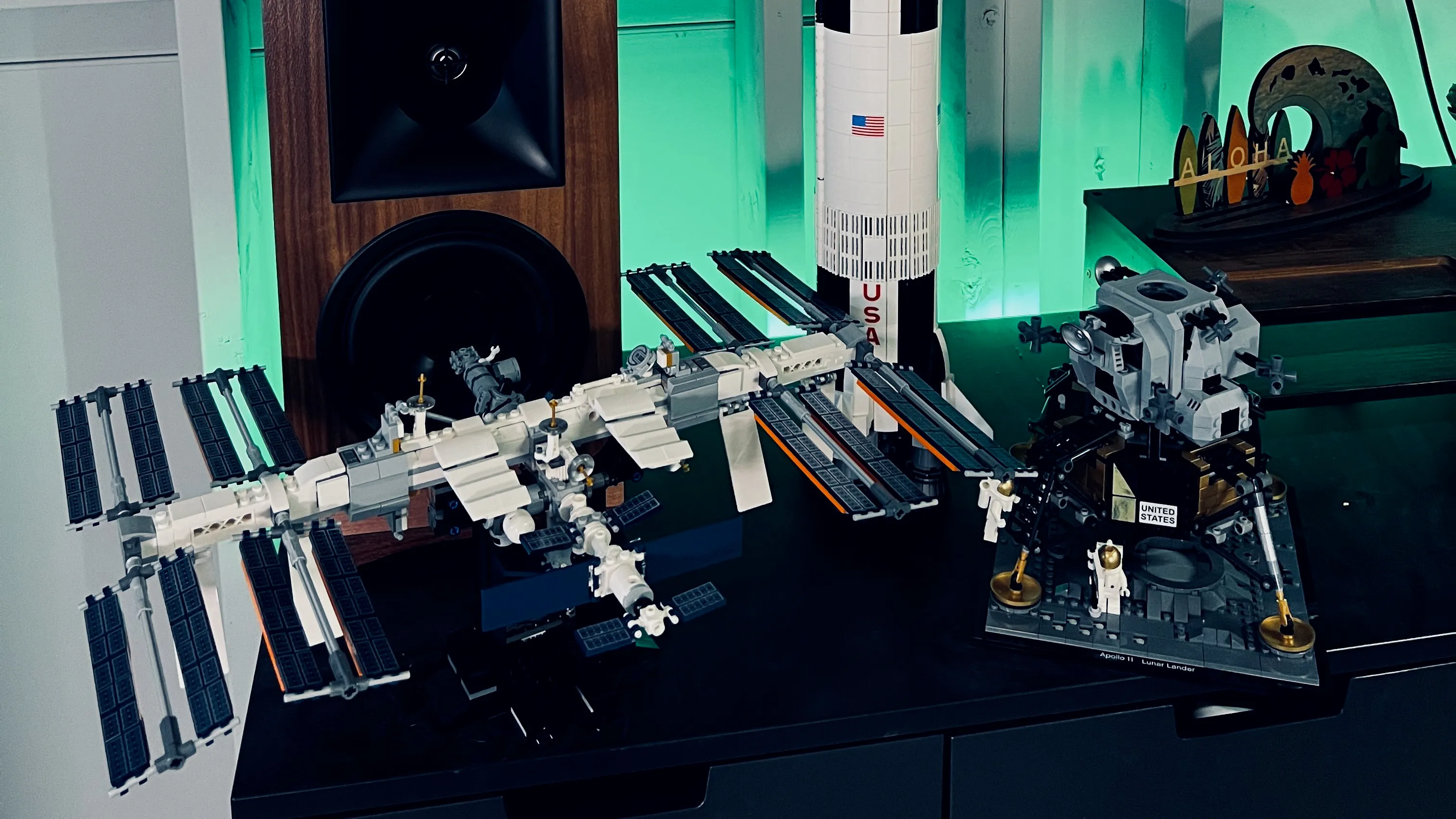 LEGO models of the ISS, a Saturn V rocket, and the Apollo lunar lander