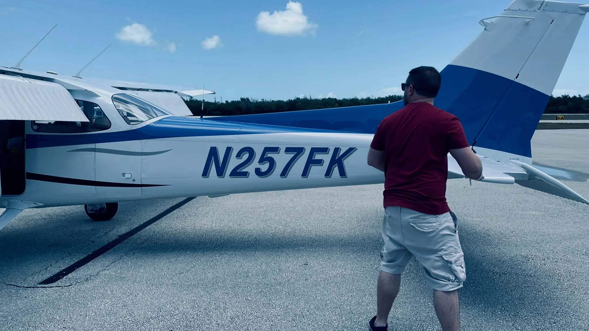 Caleb doing a preflight walkaround of a Cessna